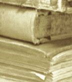 Photograph of a stack of registers dating from 1841 to 1883 including a second world war death register.