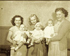 Photograph of babies at a baby show.